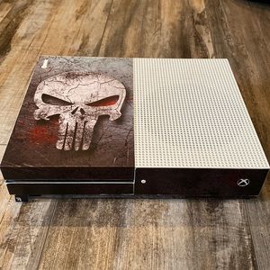 Xbox One S console and power chord plus a controller